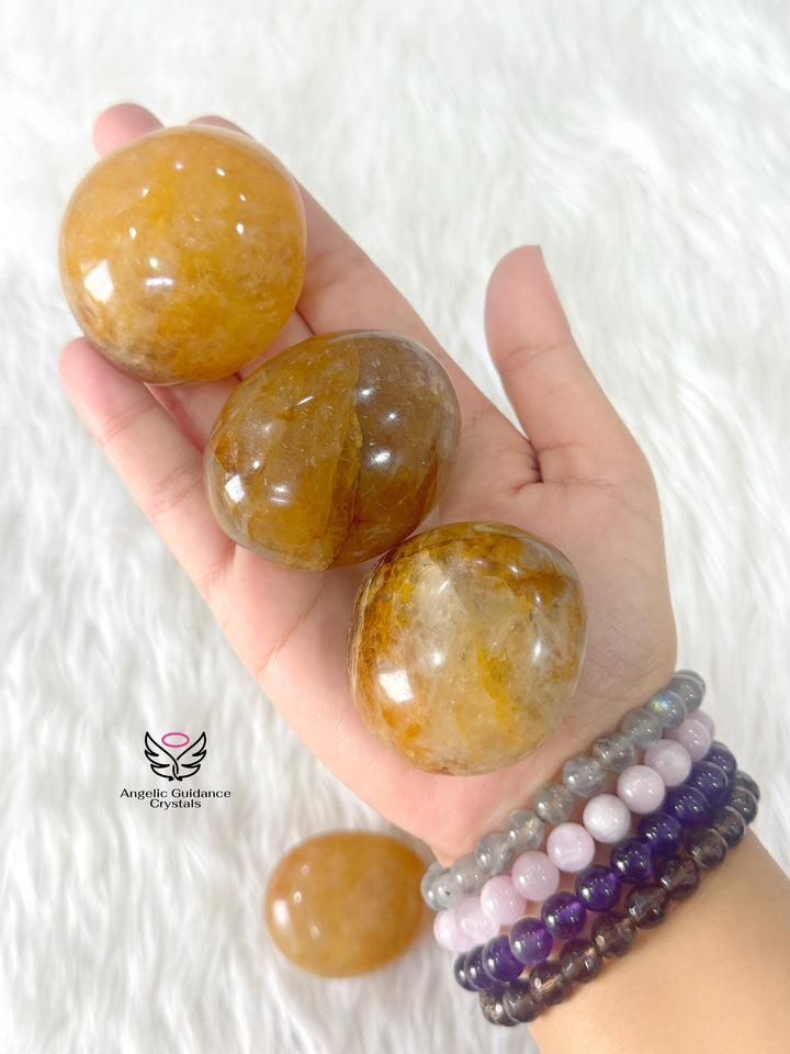 Golden Healer Quartz Palm Stone Round