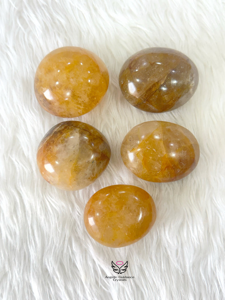Golden Healer Quartz Palm Stone Round